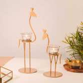 Golden metal giraffe candle holder set