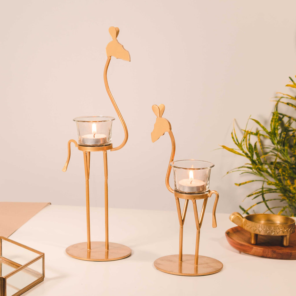 Golden metal giraffe candle holder set