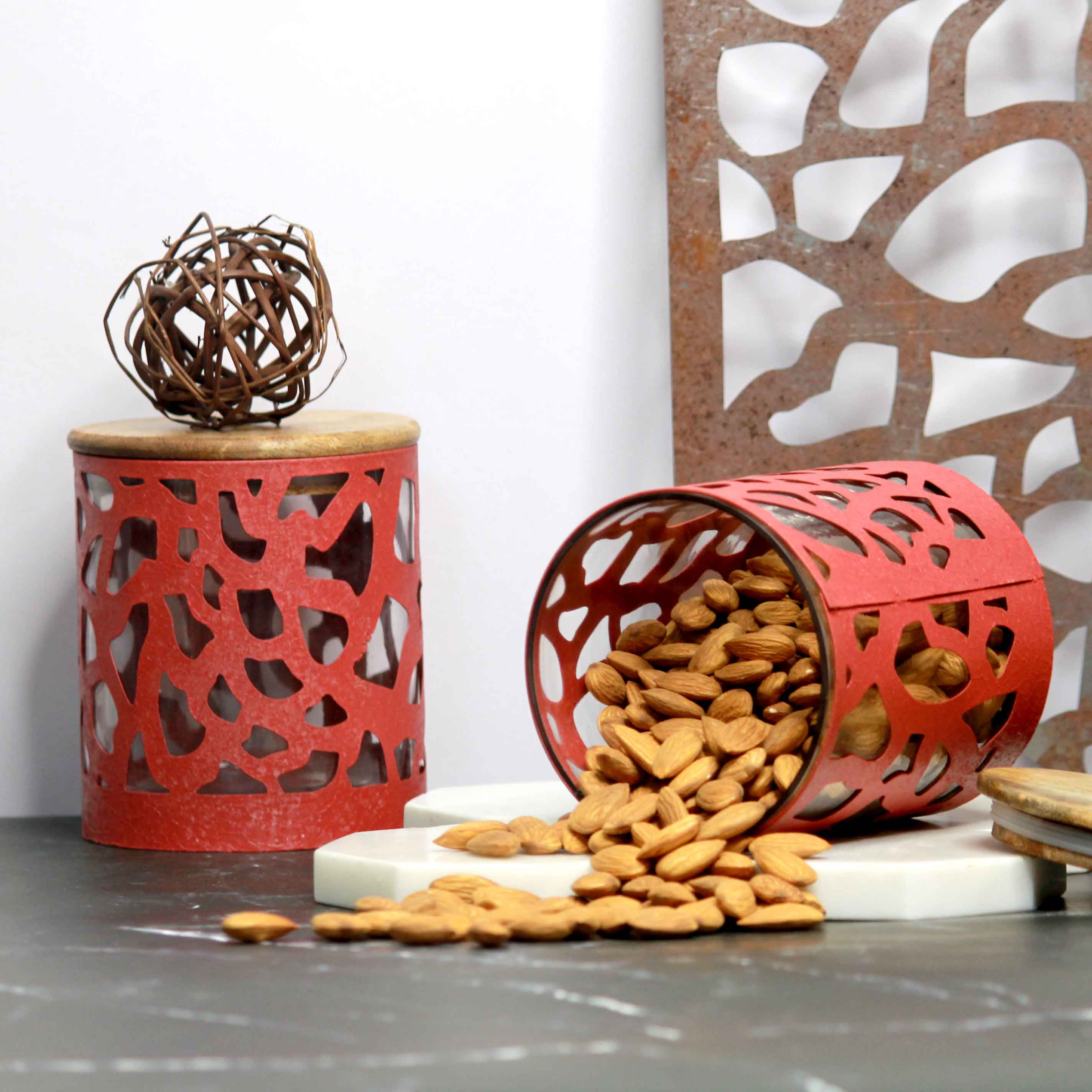 Red color metal giraffe shaped storage jar with wooden lid