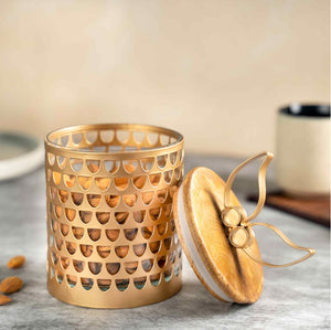 Golden jar with wooden lid and glass