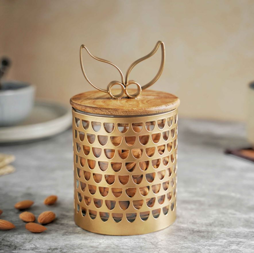 Golden jar with wooden lid and glass
